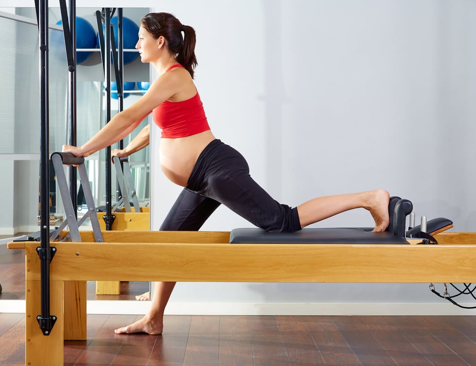 Pregnant Woman Pilates Reformer Cadillac Exercise